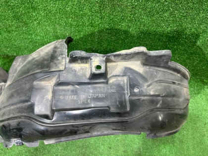 Подкрылок передний левый